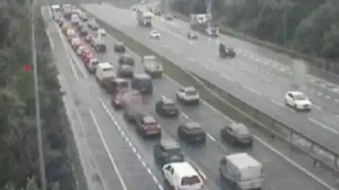 Highways England queue of vehicles on M62