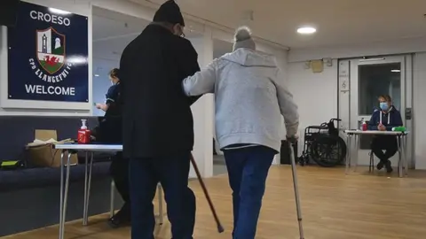 BBC A football club is being used as a vaccination centre