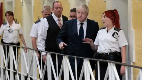 Getty Images Prime Minister Boris Johnson visiting Leeds HMP