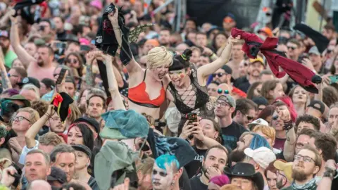 Getty Images A number of people in a crowd.