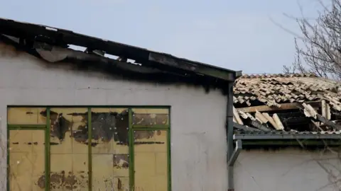 Reuters A view outside a night club, following a fire resulting in casualties, in the town of Kocani, North Macedonia, March 16, 2025.