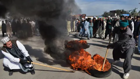 AFP/Getty Images Pakistani protesters in Peshawar, 25 November 2017