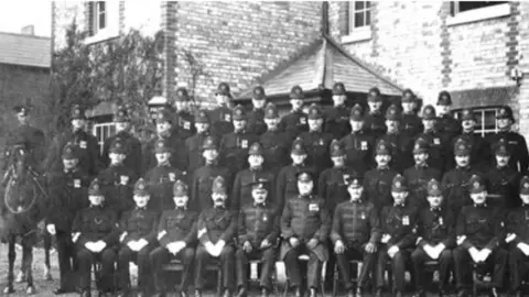 Sir William Dunn School of Pathology PC Albert Alexander stands next to the mounted police officer, second row from the top