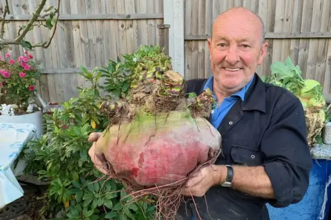 Joe Atherton Joe Atherton with his giant vegetables