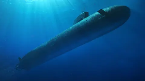 BAE artists have created an image of a large nuclear submarine, submerged in water and traveling through the ocean