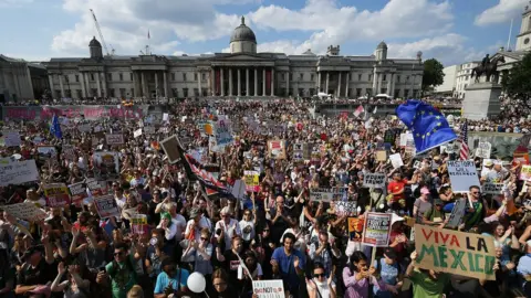 Getty Images Thousands of protesters fill Trafalgar Square to protest against Donald Trump