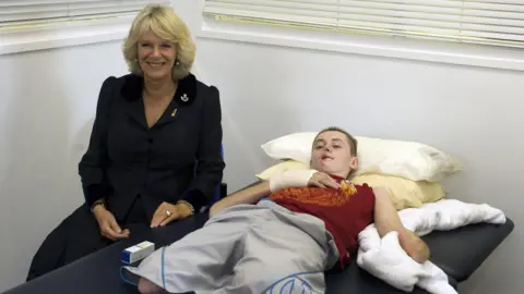 Getty Mr Wood meeting Queen Camilla