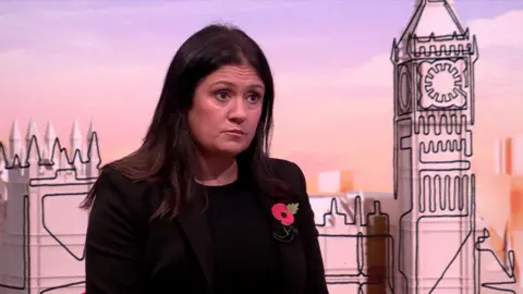 BBC Lisa Nandy in the Sunday with Laura Kuenssberg studio. She is dressed is in black and wearing a remembrance poppy. 
