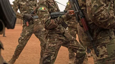 AFP Malian soldiers pictured at a military base in Timbuktu, Mali - December 2021