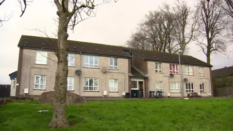 BBC A block of flats in Thornhill Parade