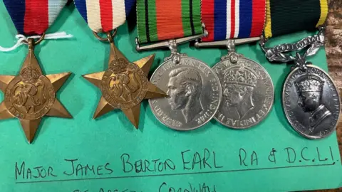 A set of five medals belonging to Major James Burton Earl for his service before and after World War Two 