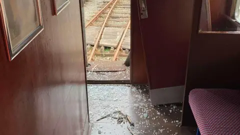 Downpatrick and County Down Railway Smashed glass on the floor of the railway carriage