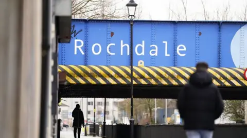 PA Media Rochdale sign on a bridge in the town