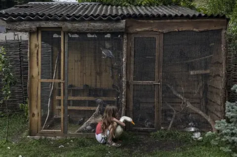Thomas Machowicz Child with a goose