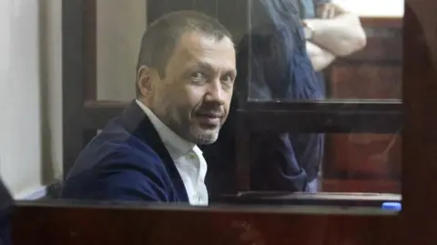 Reuters Giorgi Bachiashvili, a former aide to Georgian Dream party founder and billionaire Bidzina Ivanishvili, attends a court hearing in Tbilisi,