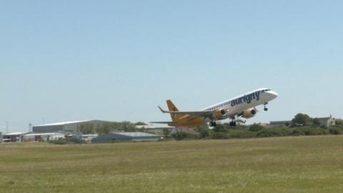 An Aurigny jet plan takes off from Guernsey airport