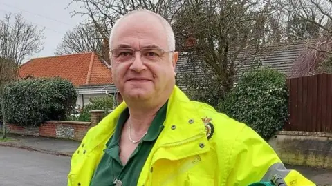 Qays Najm Three black kittens in enclosure at rescue centre