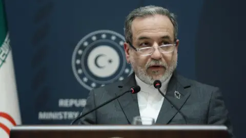 Iranian Foreign Minister Abbas Araghchi attends a news conference with his Turkish counterpart in Istanbul, Turkey (30 January 2026)