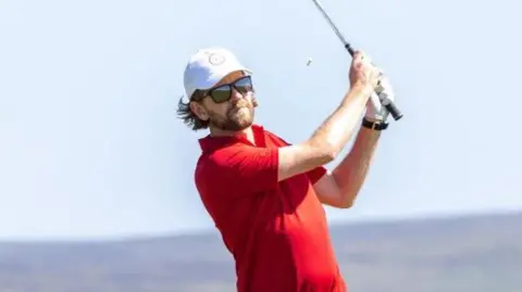 Daryl Callister swinging a golf club