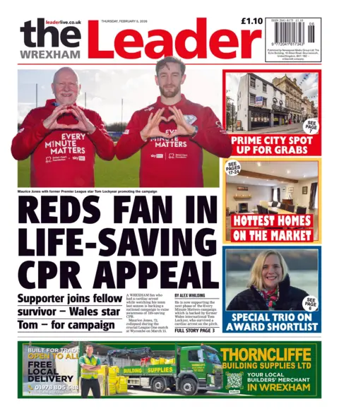 Wrexham Leader The Front page of the Wrexham Leader has two men in liverpool jersey's holding their hands together in heart shapes above the headline Red fans in life saving CPR appeal 