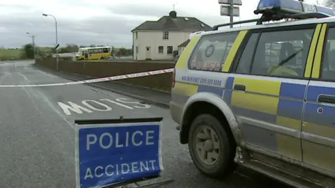 A police car stands at the site of the closed road where Nicola Murray died 