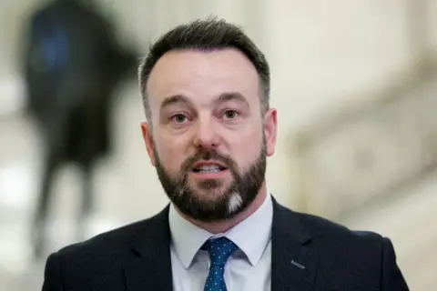 bbc  A photo of Colum Eastwood in Stormont