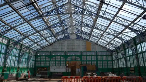 Qays Najm/BBC The cast iron structure of the Grade II listed Winter Gardens in Great Yarmouth. The picture has been taken from the inside of the building. 