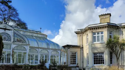 Norwich City Council A wide shot of the building, including the conservatory