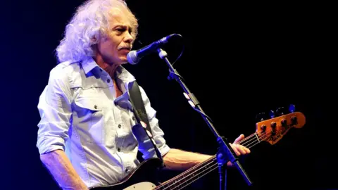 Getty Images Alan Lancaster of Status Quo performs at 02 Apollo Manchester on April 5, 2014 in Manchester, England
