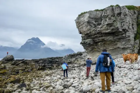 Getty Images Tourists on Skye