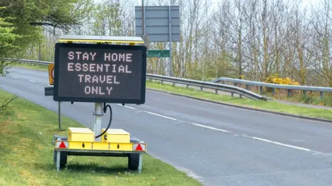 Getty Images Stay home sign