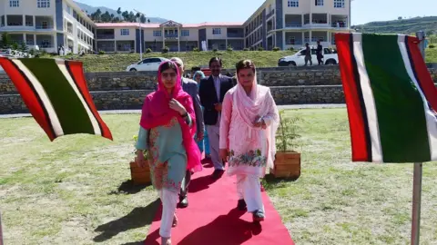 AFP/Getty Malala arriving at the all-boys Swat Cadet College Guli Bagh during her visit