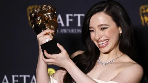 EPA Mikey Madison poses in the press room after winning the Best Actress award for 'Anora' during the BAFTA Film Awards at the Royal Festival Hall in London, Britain, 16 February 2025