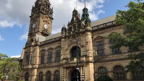 BBC A large grand Victoria stone building in the sunshine