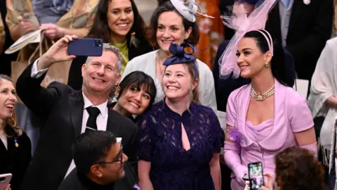 Getty Images Katy Perry with Adam Hills, host of The Last Leg