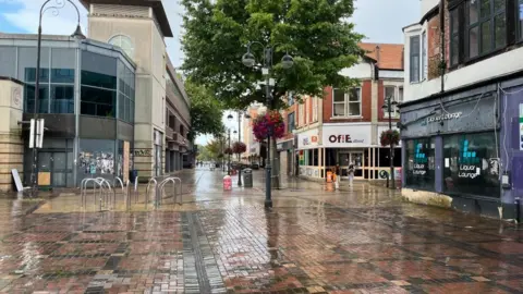BBC Swindon town centre. It's looking run down with lots of shops closed.