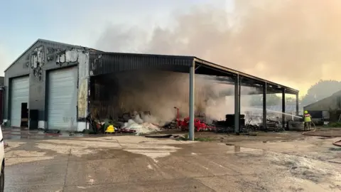 Sawbridgeworth Fire A fire-damaged farm building