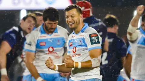 Bulls' Handre Pollard celebrates at full time during a United Rugby Championship match between Edinburgh and Vodacom Bulls at the Hive Stadium