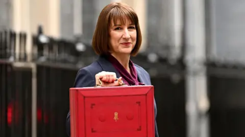 Getty Images Rachel Reeves holds chancellor's red box on Budget day