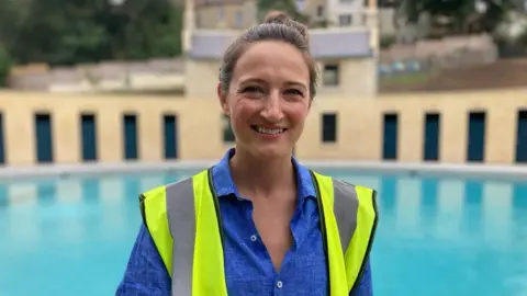 A woman in hi-vis