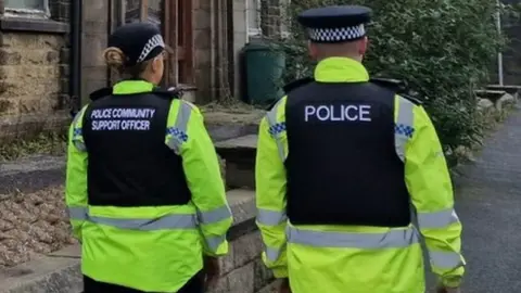 Two Lancashire Police officers on patrol