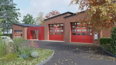 A fire station. There are two main fire engine bays built from red brick. A large, red garage door is on the front of each. To the left is a small red building and a small brick building. There is grey tarmac in front of the buildings and grass on the left