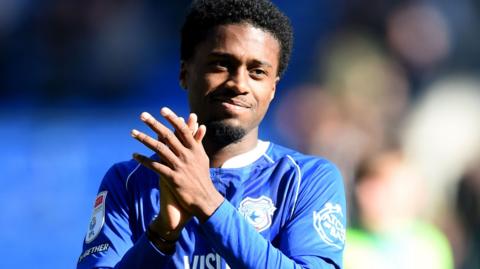 Raheem Conte applauds fans during Cardiff City's win over Southampton