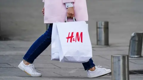 Getty Images Shopper with H&M bag