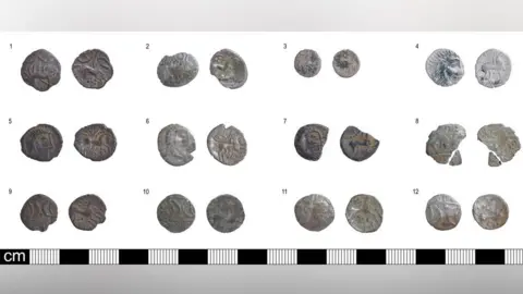 Andrew Williams/Norfolk County Council Twelve Iron Age silver coins in three rows, showing both sides of each coins