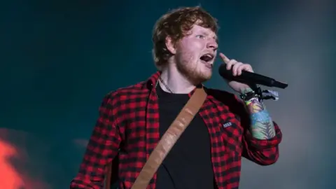 AFP / Getty Images Ed Sheeran performs at Glastonbury