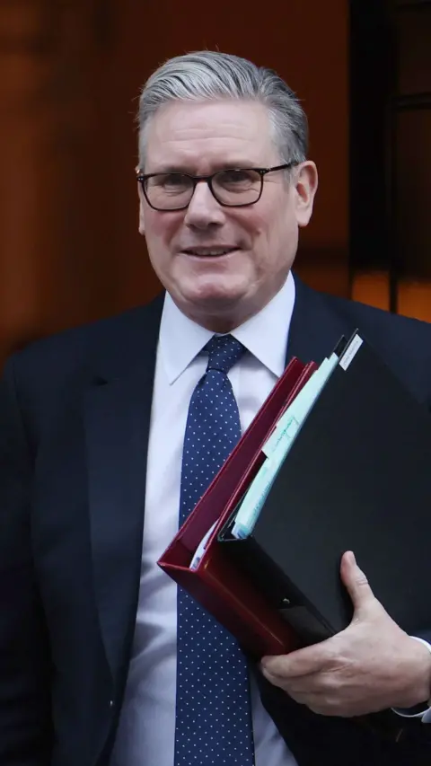 Sir Kier Starmer in a suit.