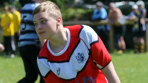 Chris Edwards Reuben Kelman playing rugby