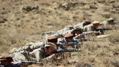 Getty Images Afghan National Resistance Front fighters training in the Panjshir Valley, 4 September 2021