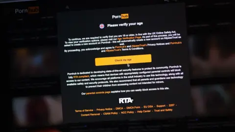 BBC The PornHub website, with an age verification screen. 